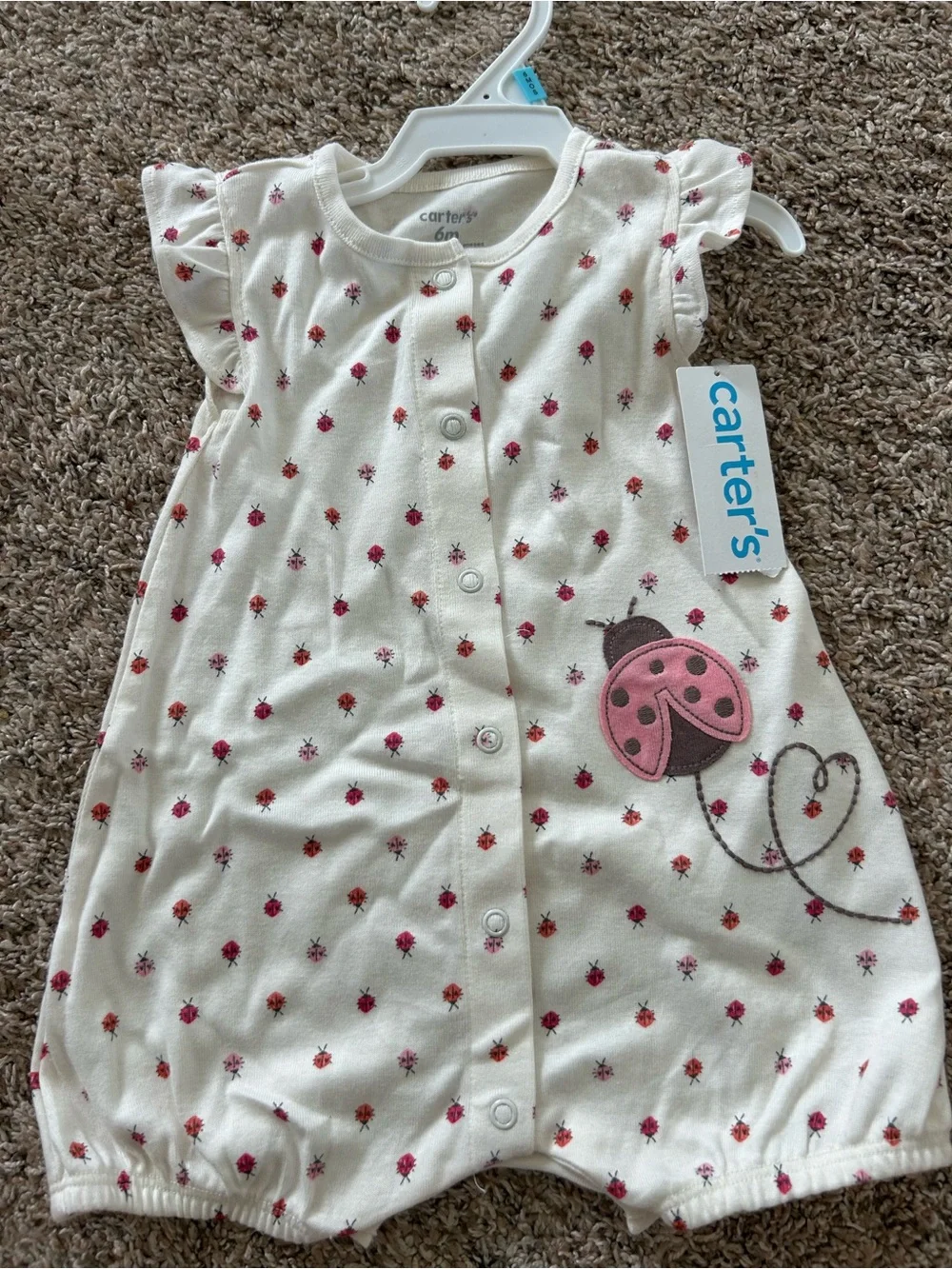 Carter's Cream Short-Sleeve Romper Pajamas with Pink Ladybug Motif